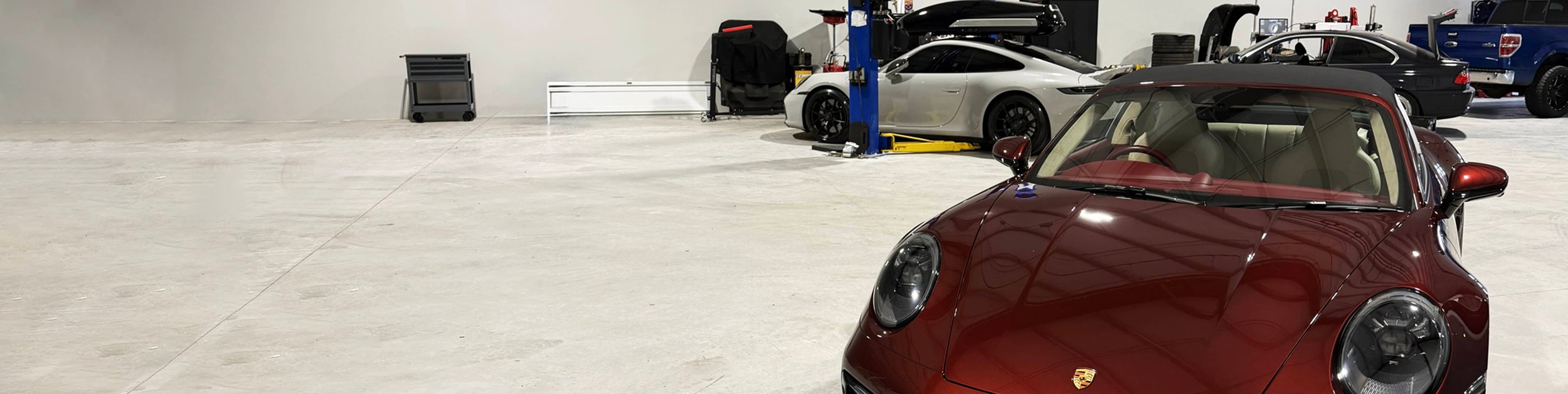 vehicle on the lift at Tizzano Automotive in Plain City, OH